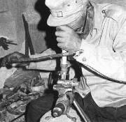 Master Locksmith Taqi at work - Click for enlargement.